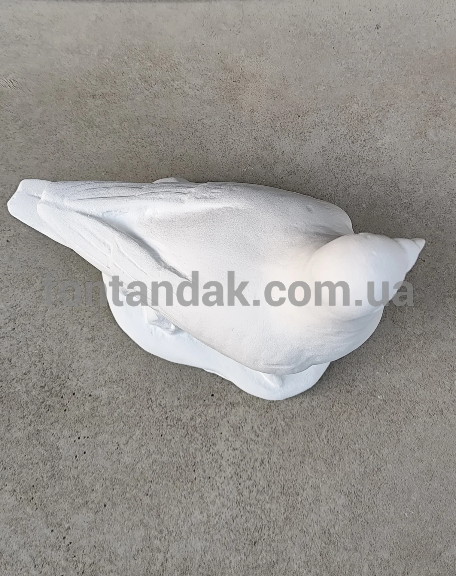 Скульптура голуба